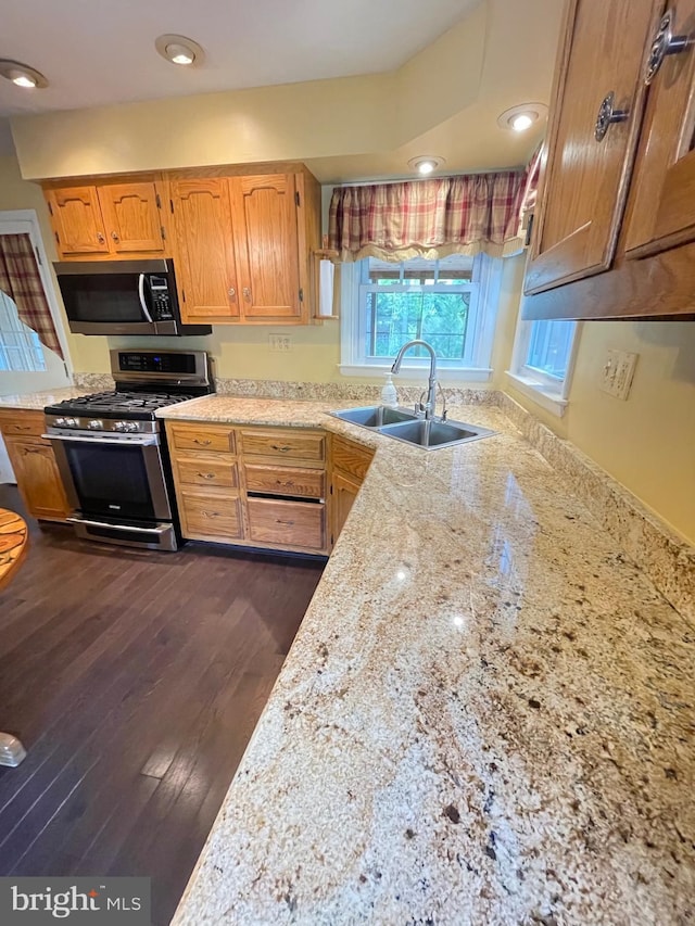 604 Ivystone Ln, Cinnaminson, NJ 08077 - kitchen with stainless steel appliances, a sink, light stone countertops, brown cabinets, and recessed lighting