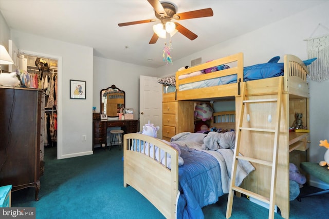 2009 Creekside Ct Unit 28, Warrington, PA 18976 - carpeted bedroom featuring a spacious closet, a closet, a ceiling fan, and baseboards