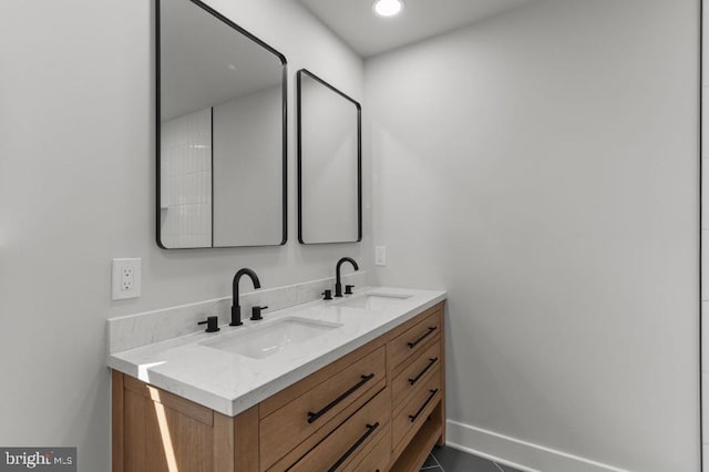 411 New York Ave, Croydon, PA 19021 - bathroom featuring double vanity and baseboards