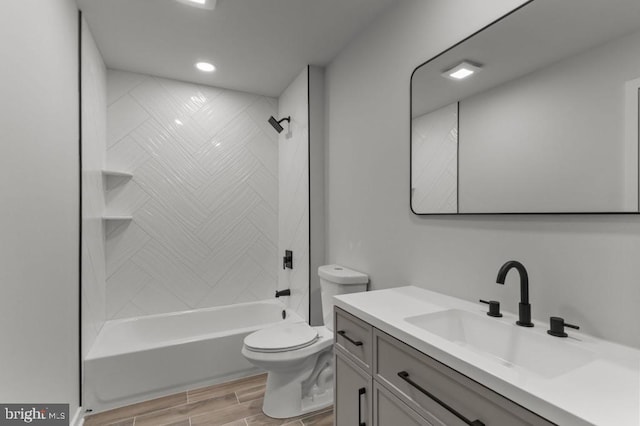 411 New York Ave, Croydon, PA 19021 - bathroom with vanity, toilet, tub / shower combination, wood finish floors, and recessed lighting