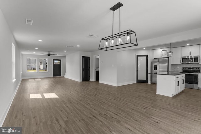 411 New York Ave, Croydon, PA 19021 - unfurnished living room featuring dark wood finished floors, ceiling fan, baseboards, and recessed lighting