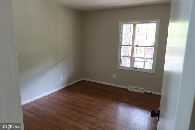 21605 Columbia St, Lexington Park, MD 20653 - unfurnished room featuring dark wood-style flooring and baseboards