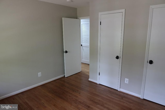 21605 Columbia St, Lexington Park, MD 20653 - unfurnished bedroom with wood finished floors and baseboards