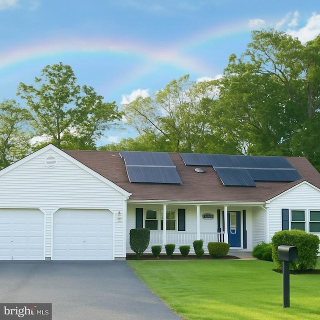 470 N Nautilus Dr, Manahawkin, NJ 08050 - view of front of property featuring covered porch, an attached garage, a front lawn, asphalt driveway, and roof mounted solar panels