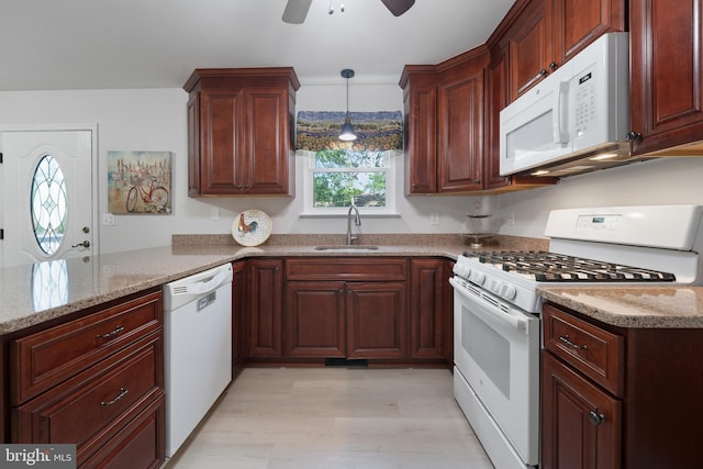470 N Nautilus Dr, Manahawkin, NJ 08050 - kitchen with white appliances, a ceiling fan, a peninsula, light wood-type flooring, and light stone counters