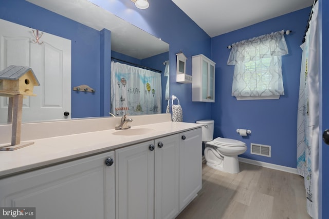 470 N Nautilus Dr, Manahawkin, NJ 08050 - bathroom with wood finished floors, vanity, and a shower with curtain