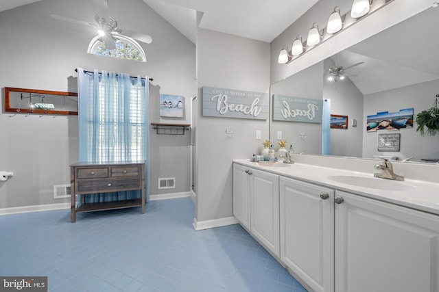 470 N Nautilus Dr, Manahawkin, NJ 08050 - bathroom featuring ceiling fan, vaulted ceiling, double vanity, and tile patterned floors