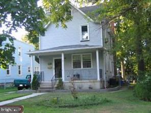 515 Lincoln Ave, Collingswood, NJ 08108 - view of front of home with covered porch and a front yard