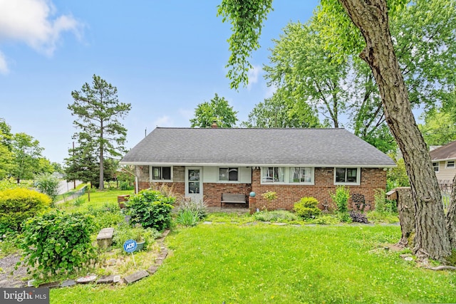 2000 Longview Ct, Baltimore, MD 21237 - view of front of home featuring brick siding, a chimney, and roof with shingles