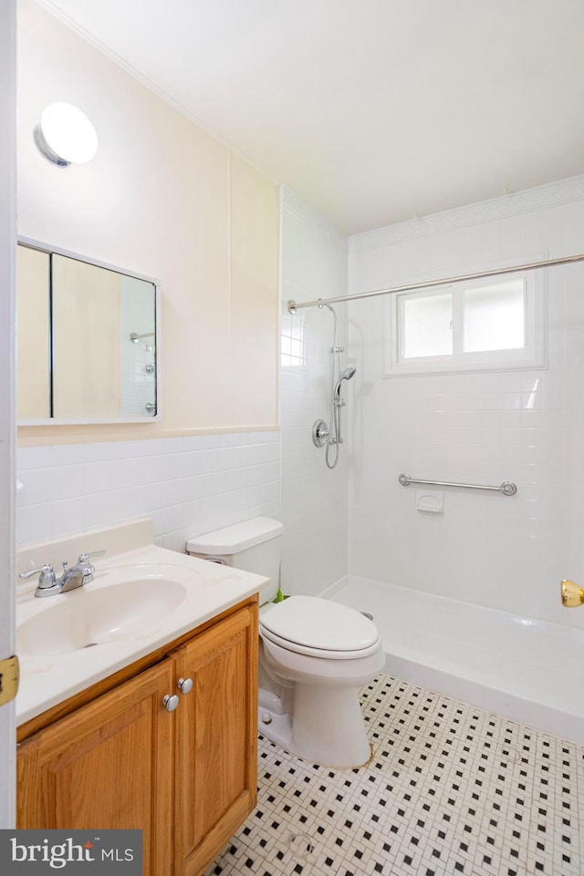 2000 Longview Ct, Baltimore, MD 21237 - full bath with tile patterned flooring, tiled shower, vanity, and tile walls
