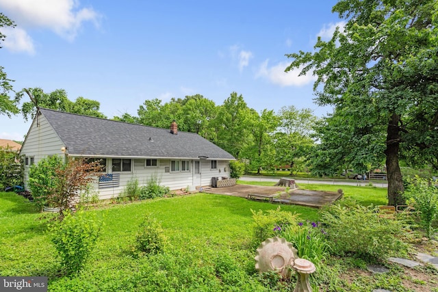 2000 Longview Ct, Baltimore, MD 21237 - back of property with a patio area, a chimney, and roof with shingles