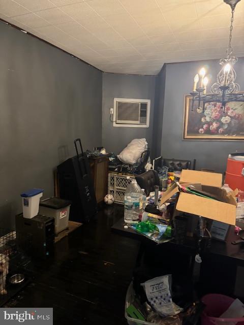 4146 Robbins Ave, Philadelphia, PA 19135 - dining space with wood finished floors and a chandelier