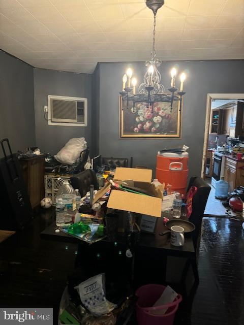 4146 Robbins Ave, Philadelphia, PA 19135 - dining room featuring a chandelier and a wall mounted AC