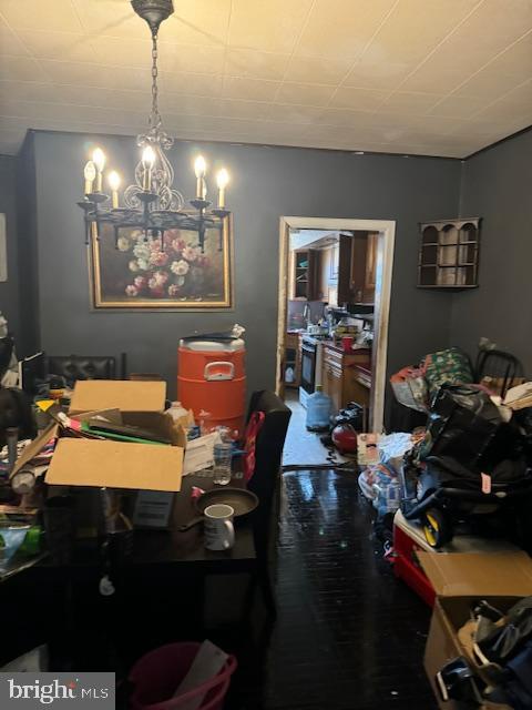 4146 Robbins Ave, Philadelphia, PA 19135 - dining space with a chandelier and wood finished floors