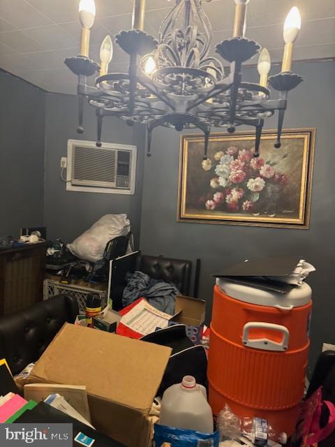4146 Robbins Ave, Philadelphia, PA 19135 - dining room with a chandelier and a wall mounted AC