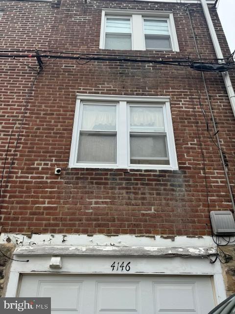 4146 Robbins Ave, Philadelphia, PA 19135 - exterior view of brick siding