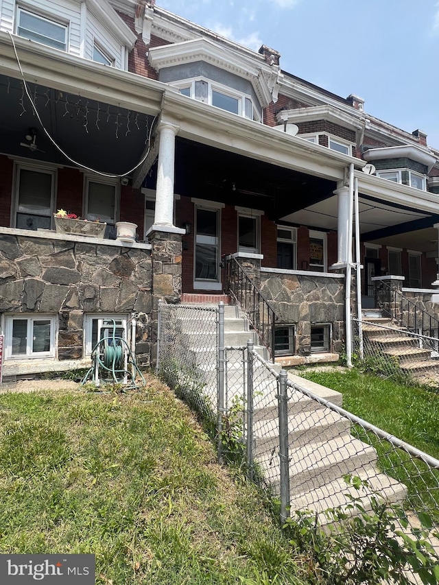 2732 Riggs Ave, Baltimore, MD 21216 - view of home's exterior with stone siding and a porch