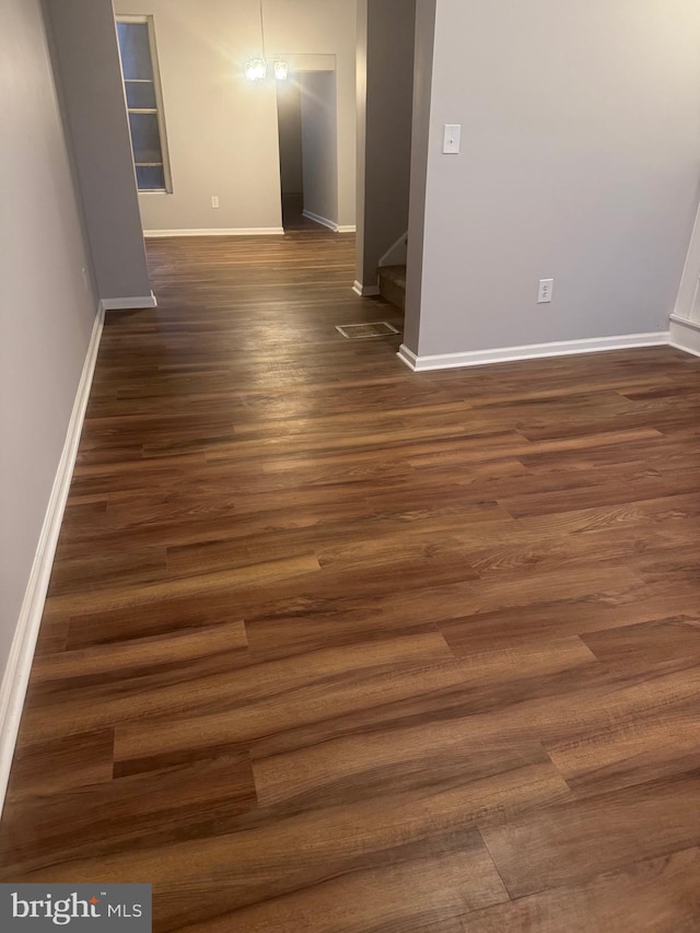 2732 Riggs Ave, Baltimore, MD 21216 - empty room with dark wood finished floors and baseboards