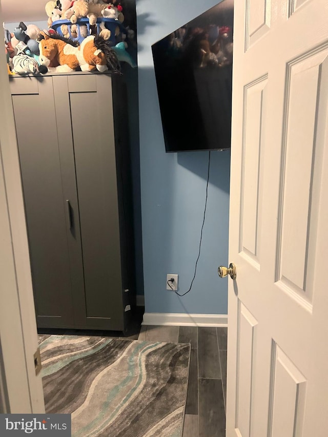 6540 Parnell Ave, Baltimore, MD 21222 - detailed view of baseboards and wood finished floors