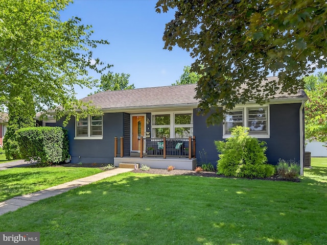 303 Stevens Ave, Reading, PA 19608 - ranch-style home with a porch, a front yard, and central AC