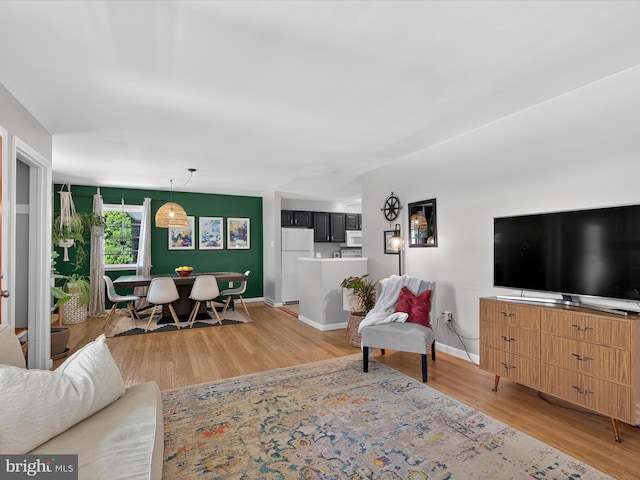 303 Stevens Ave, Reading, PA 19608 - living area featuring light wood-style flooring and baseboards