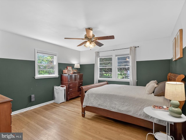 303 Stevens Ave, Reading, PA 19608 - bedroom with wood-type flooring, ceiling fan, and baseboards