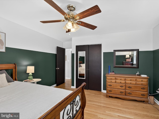 303 Stevens Ave, Reading, PA 19608 - bedroom with light wood-style floors, a closet, ceiling fan, and baseboards