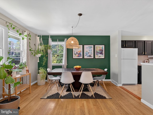 303 Stevens Ave, Reading, PA 19608 - dining room featuring light wood-type flooring and baseboards