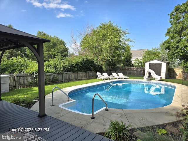 17 Goldenrod Dr, Carlisle, PA 17015 - view of swimming pool featuring a water slide and a wooden deck