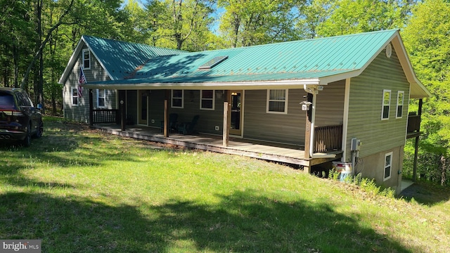 1725 Loop Rd, Franklin, WV 26807 - rear view of property with a lawn and metal roof