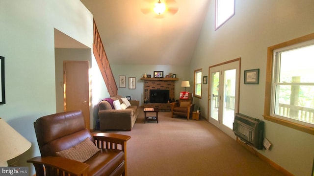 1725 Loop Rd, Franklin, WV 26807 - carpeted living room featuring a brick fireplace and a towering ceiling
