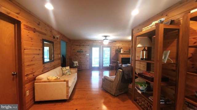 1725 Loop Rd, Franklin, WV 26807 - living area with wooden walls, wood finished floors, ceiling fan, and french doors