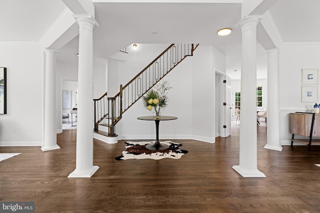 5204 Muirfield Dr, Ijamsville, MD 21754 - foyer entrance featuring wood finished floors, stairs, crown molding, and baseboards