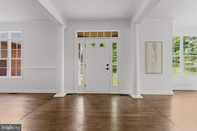 5204 Muirfield Dr, Ijamsville, MD 21754 - foyer entrance with decorative columns, wood finished floors, baseboards, and ornamental molding