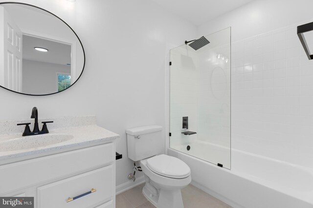 5204 Muirfield Dr, Ijamsville, MD 21754 - full bath featuring vanity, toilet, washtub / shower combination, tile patterned floors, and baseboards
