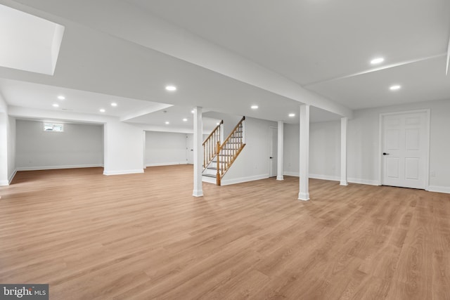 5204 Muirfield Dr, Ijamsville, MD 21754 - finished basement with recessed lighting, stairway, baseboards, and light wood-style flooring