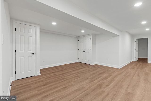 5204 Muirfield Dr, Ijamsville, MD 21754 - finished below grade area with recessed lighting, light wood-type flooring, and baseboards