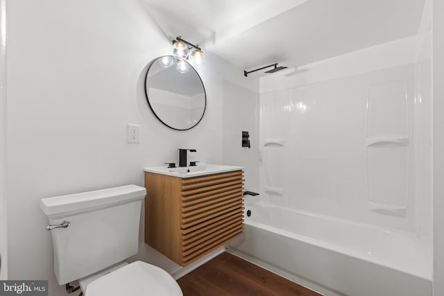 5204 Muirfield Dr, Ijamsville, MD 21754 - bathroom with toilet, vanity, shower / bathtub combination, and wood finished floors