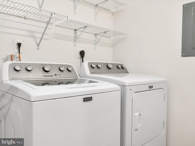 621 Admiral Dr Unit 207, Annapolis, MD 21401 - washroom featuring washing machine and dryer and electric panel