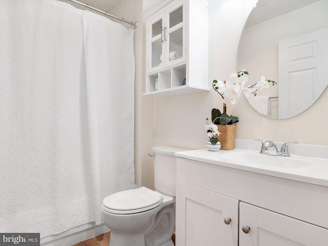621 Admiral Dr Unit 207, Annapolis, MD 21401 - full bathroom with vanity, toilet, a shower with shower curtain, and wood finished floors