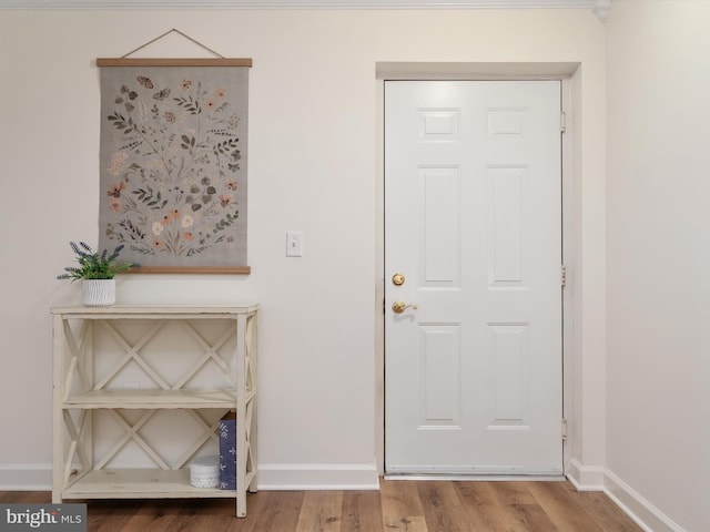 621 Admiral Dr Unit 207, Annapolis, MD 21401 - foyer entrance with baseboards and wood finished floors