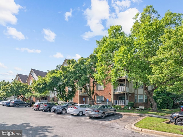 621 Admiral Dr Unit 207, Annapolis, MD 21401 - view of property featuring uncovered parking