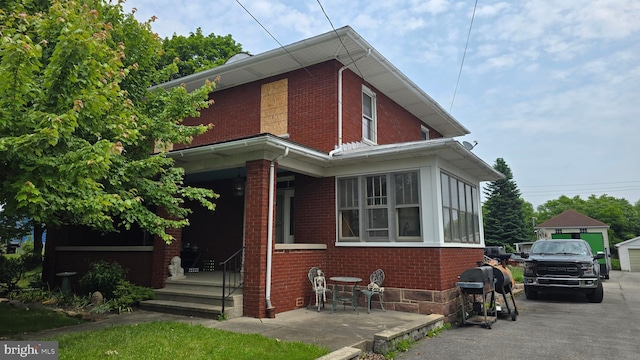 4759 Carlisle Rd, Dover, PA 17315 - view of front of property featuring brick siding and a porch