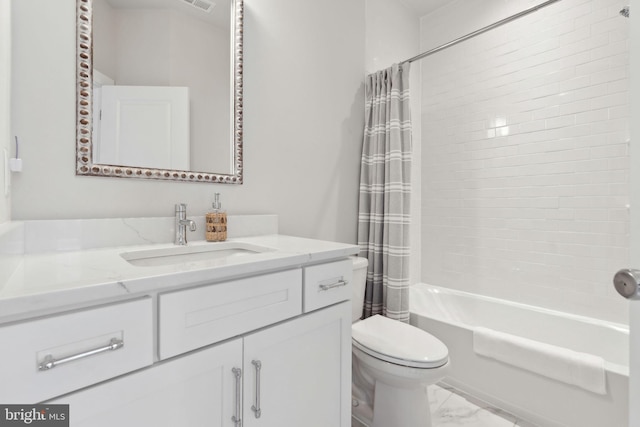 13126 Hawkeye Aly, Clarksburg, MD 20871 - bathroom featuring marble look tiles, vanity, toilet, and shower / bath combo with shower curtain