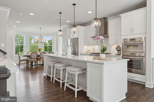 13126 Hawkeye Aly, Clarksburg, MD 20871 - kitchen featuring appliances with stainless steel finishes, light countertops, recessed lighting, white cabinets, and an island with sink