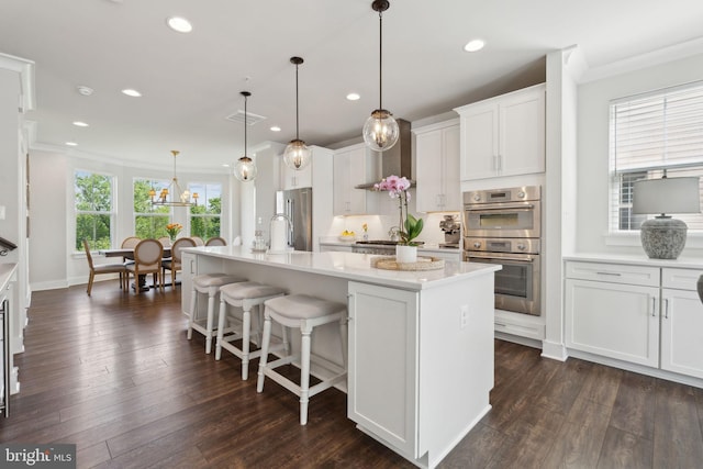 13126 Hawkeye Aly, Clarksburg, MD 20871 - kitchen featuring ornamental molding, recessed lighting, light countertops, appliances with stainless steel finishes, and white cabinets