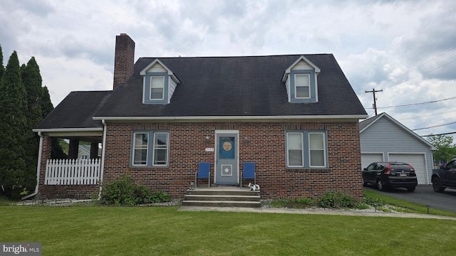 2103 W Trindle Rd, Carlisle, PA 17013 - cape cod house featuring brick siding, a chimney, and a front lawn