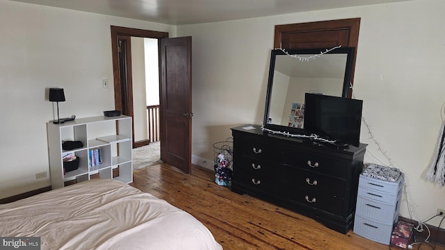 2103 W Trindle Rd, Carlisle, PA 17013 - bedroom featuring wood finished floors and baseboards