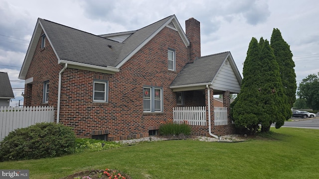 2103 W Trindle Rd, Carlisle, PA 17013 - view of side of property featuring brick siding, a chimney, covered porch, and a shingled roof