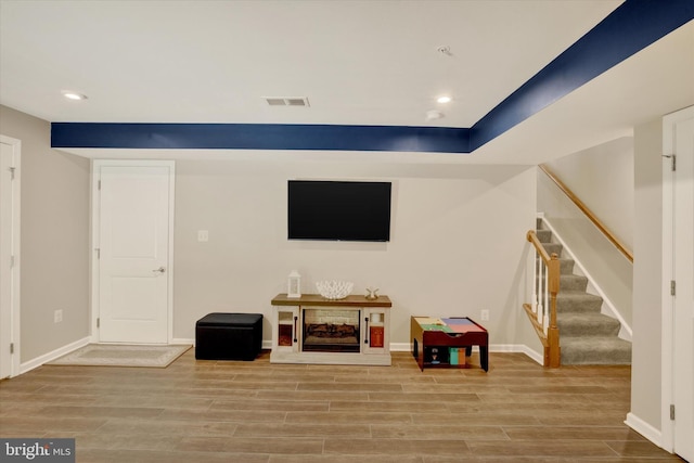 182 Mohegan Dr, Havre De Grace, MD 21078 - living area featuring wood finished floors, stairs, recessed lighting, and baseboards